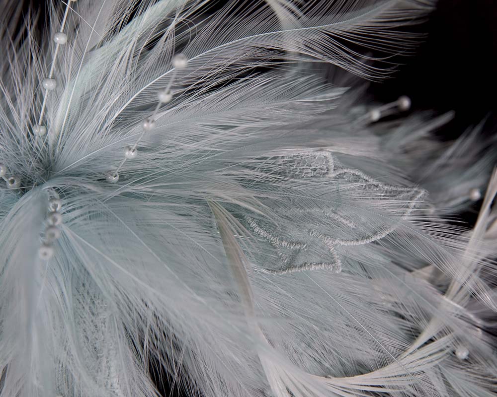 Light blue custom made feather fascinator comb