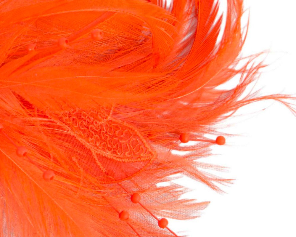 Orange custom made feather fascinator comb