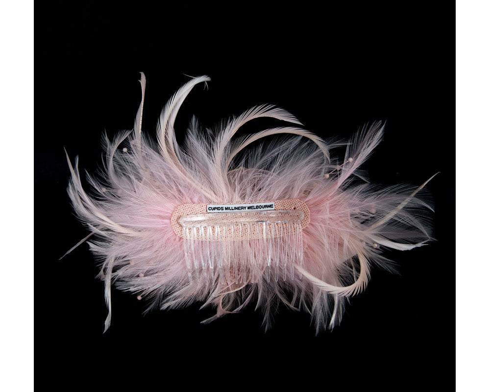Pink custom made feather fascinator comb