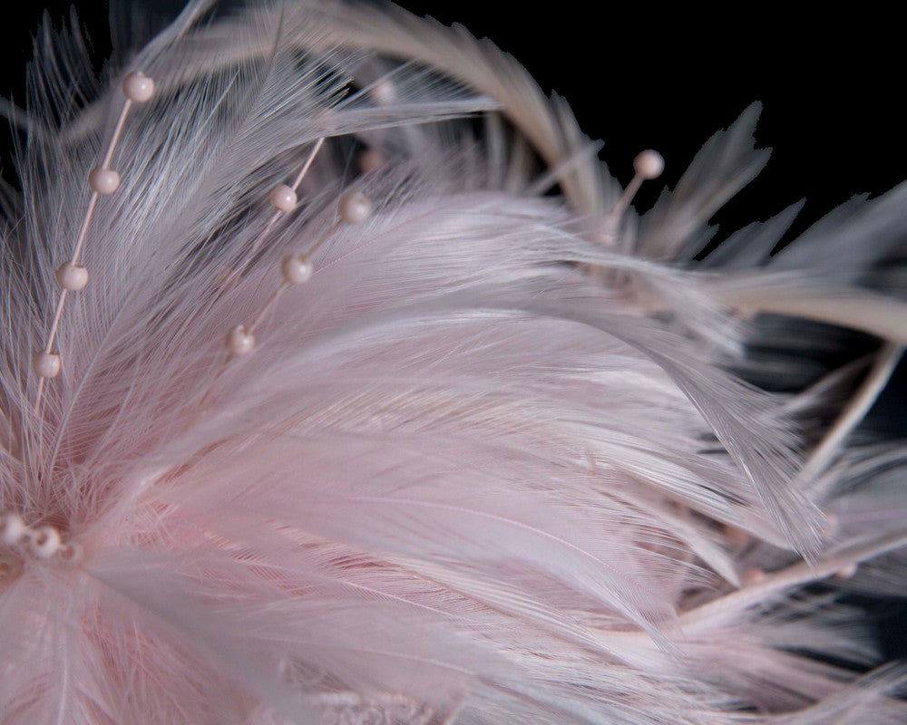 Pink custom made feather fascinator comb
