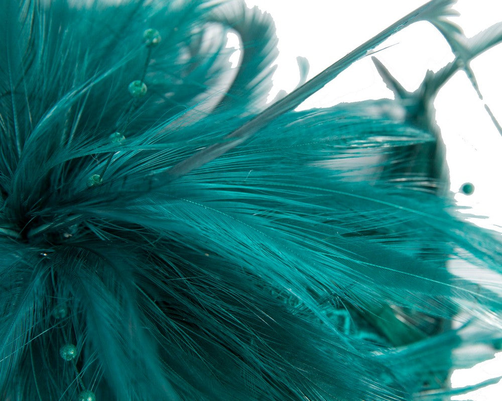 Teal custom made feather fascinator comb